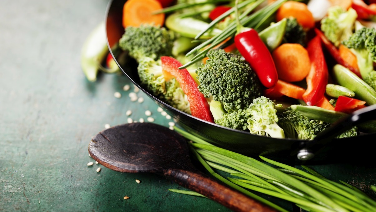 Chinese cuisine. Wok cooking vegetables.
